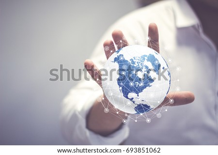 Media worldwide technology concept and Businessman hands carrying world map - rule the world, world domination concepts