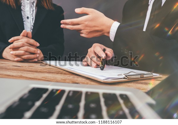 Mediation client meeting\
lawyer consulting government help,\
Businessman and Male lawyer or\
judge consult having team meeting with client, Law and Legal\
services concept.