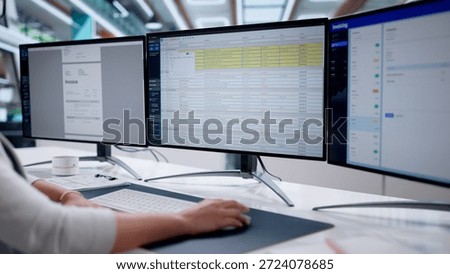 Medical Accountant Using Computer Software In Office Payroll Processing