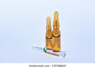 Medical Amber And Clear Glass Ampoule, Contains Ampule. Medication, Medicament, Steroid, Vaccine, Antidote Or Drug.