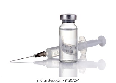 medical ampoules and syringe isolated on white