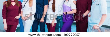 medical background. multinational people - doctor, nurse and surgeon. a group of faceless doctors. medical advertisement design. wide promotional banner