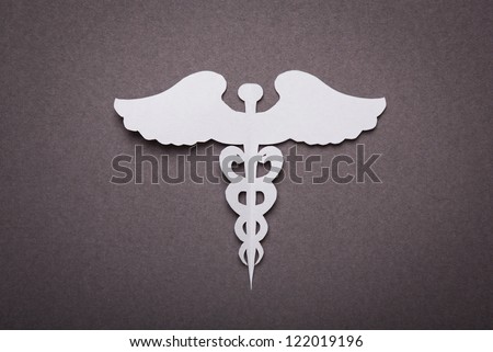 Medical background, Paper cut of Caduceus medical symbol with copy space for text or design