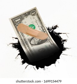 Medical bandage on one dollar bill inside dark hole on world financial economical crisis
