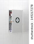 Medical cabinet on wall
