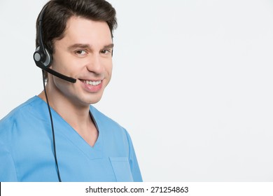 Medical Call Center Concept - Man With Headphone Isolated On White
