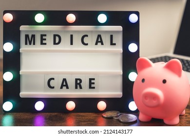 Medical Care Phrase Spelled On Marquee Lightbox - Savings For Healthcare Concept. High Quality Photo