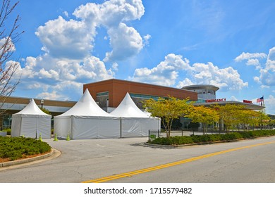 Medical Center With Tents Set Up Outside The Emergency Room Entrance To Screen People With Symptoms Of The Novel Coronavirus Away From Other Patients 