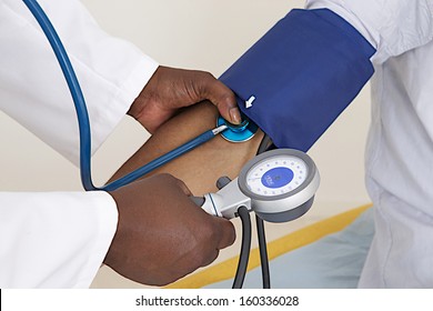 Medical Check Up - Focus On Blood Pressure And Manometer And Patient Arm