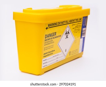 Medical or clinical sharps yellow waste container - Shutterstock ID 297024191