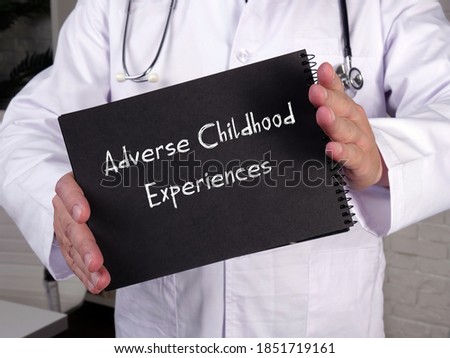 Medical concept about Adverse Childhood Experiences with phrase on the sheet.
