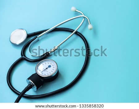 Medical concept background. Stethoscope on doctor blue.