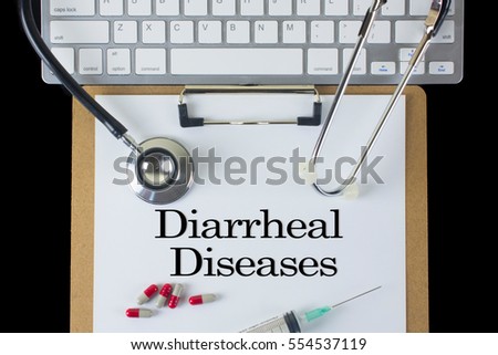 Medical Concept: Diarrheal Diseases with syringe, stethoscope, pill and keyboard Stock photo © 