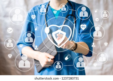 Medical Concept Doctor Pushing Button Heart Pulse Security Shield Virus Health Care Network On Virtual Panel.