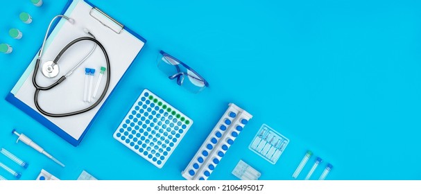 Medical Concept Of Health Care, Clinical Diagnostics, Laboratory Tests, Analysis, Physiological Examination, Doctoral Accessories. Purity, White And Blue Color, Flat Lay.