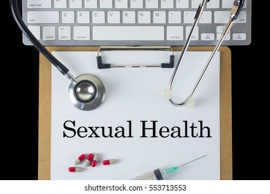 Medical Concept: Sexual Health With Syringe, Stethoscope, Pill And Keyboard