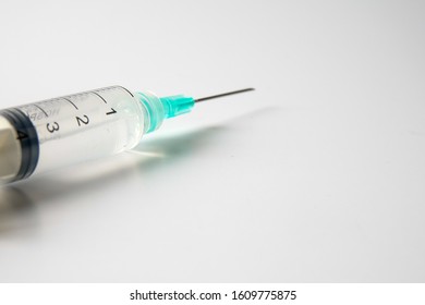 Medical concept with syringe for vaccination isolated on white.