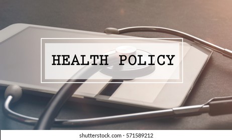 Medical Concept: Word Written HEALTH POLICY With Stethoscope And Electronic Tablet.Filter Applied.