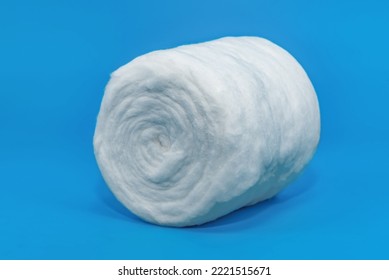 Medical Cotton Wool On A Blue Background Close-up. Cotton Ball