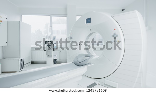 Medical CT or MRI or PET Scan Standing\
in the Modern Hospital Laboratory. Technologically Advanced and\
Functional Mediсal Equipment in a Clean White\
Room.