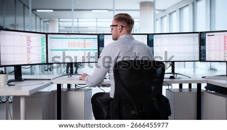 Medical Data Coding: Man Analyzing Patient Billing With Spreadsheet Software.