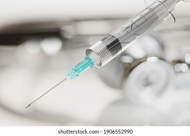 Medical Disposable Syringe With Needle For Vaccine Injection On Gray Blur Background. 