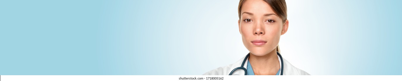 Medical Doctor Asian Woman Portrait With Serious Expression Banner Panoramic Blue Background.