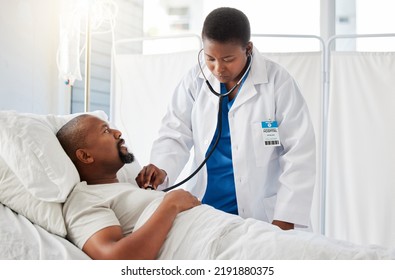 Medical Doctor Doing Heart Health Checkup On Patient In Bed, Listening For Healthy Heartbeat And Consulting Black Man After Surgery At Hospital. Sick Male Person Doing Tests With Healthcare Worker