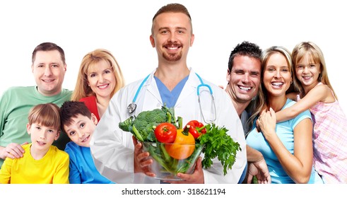 Medical Doctor And Happy Family Isolated On White Background.