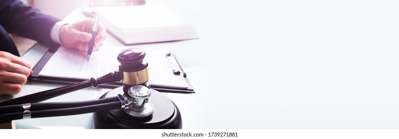 Medical Doctor Malpractice. Gavel And Stethoscope In Law Court 