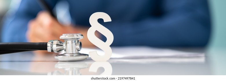 Medical Doctor Malpractice. Paragraph And Stethoscope In Law Court - Shutterstock ID 2197497841