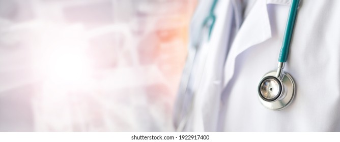 Medical doctor or physician in white gown uniform with stethoscope in hospital or clinic flighting with COVID-19 for background banner