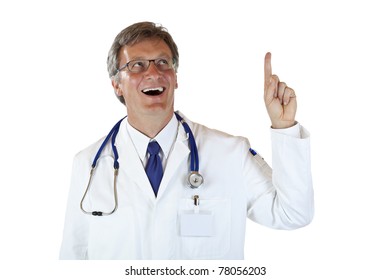 Medical doctor with stethoscope pointing up at copyspace. Isolated on white background.