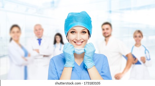 Medical Doctor Surgical Woman Excited Smile With Team Group Of People In Hospital, Nurse Wear Blue Surgery Suit Gloves Mask Cap