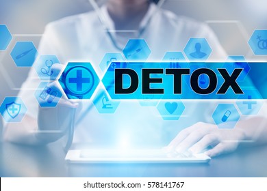 Medical doctor using tablet PC with detox medical concept.