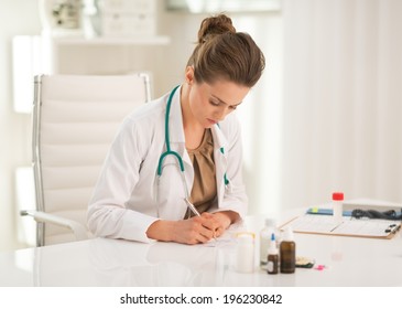 Medical Doctor Woman Writing Prescription