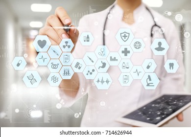 Medical Doctor Working With Modern Computer Virtual Screen Interface. Medicine Technology And Healthcare Concept. EMR, EHR, Electronic Health Records.