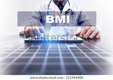 Medical doctor working with modern computer and selecting BMI. 