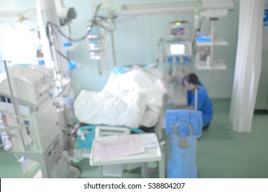 Medical doctor working with patient, unfocused background