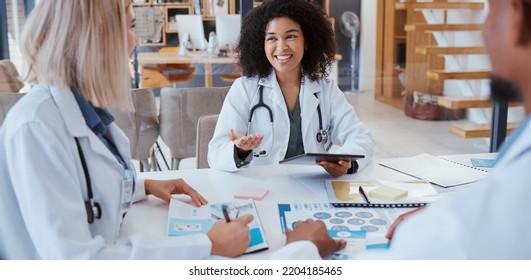 Medical doctors talk about research, consulting each others scientific opinion and giving expert analysis of patients health. Clinics can help people by providing quality services that are affordable - Shutterstock ID 2204185465