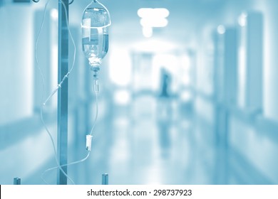 Medical Drip On The Background Of Blurred Hospital Corridor