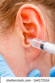 Medical Ear Wash With Water In Syringe