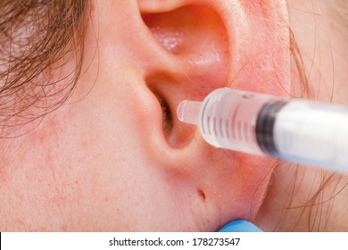 Medical Ear Wash With Water In Syringe