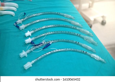Medical equipment for airway management : endotracheal tube on green background                                 