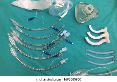 Medical Equipment For Airway Management : Orophalyngial Airway, Oral Airway And Mask With Bag On Green  