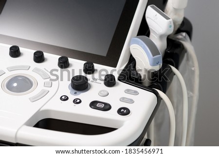 Medical equipment in the clinic. Modern ultrasound machine, scanners and sensors close-up.