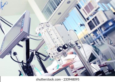 Medical equipment in the foreground of the patient's room 