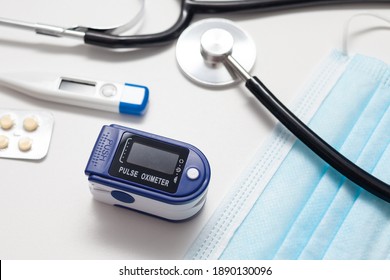 Medical Equipment On The Doctor's Desk. Oximeter