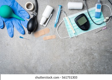 Medical Equipment On Gray Stone Background.