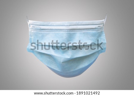 Medical face mask isolated with clipping path on grey background (front view) for covid-19, coronavirus, virus infection prevention and hygience safety protection for doctor